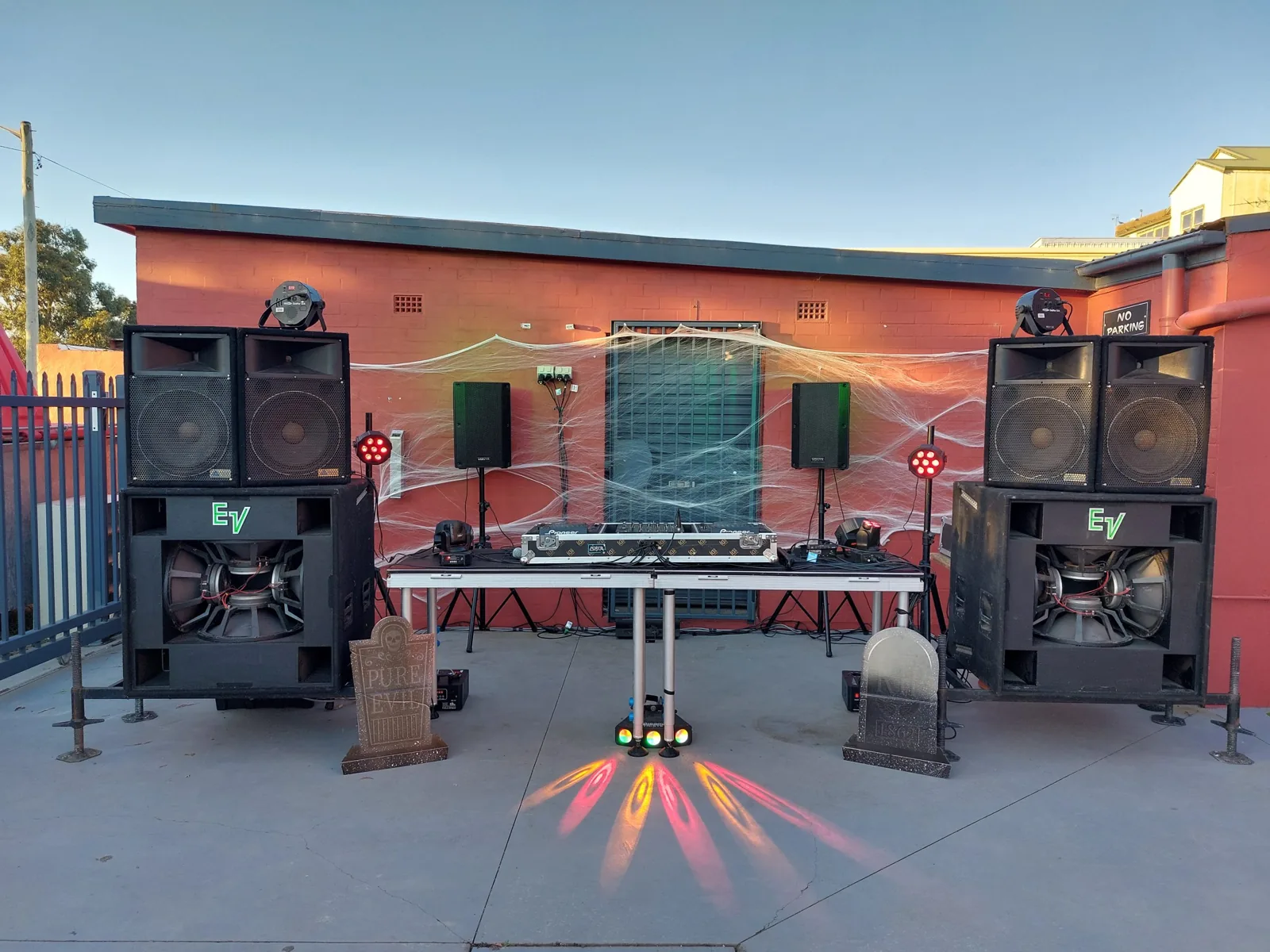 Club bass sound system on a courtyard stage with lighting